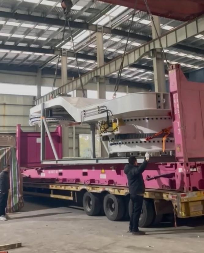 Spooling arm loaded for transport to ST Engineering Shipyard