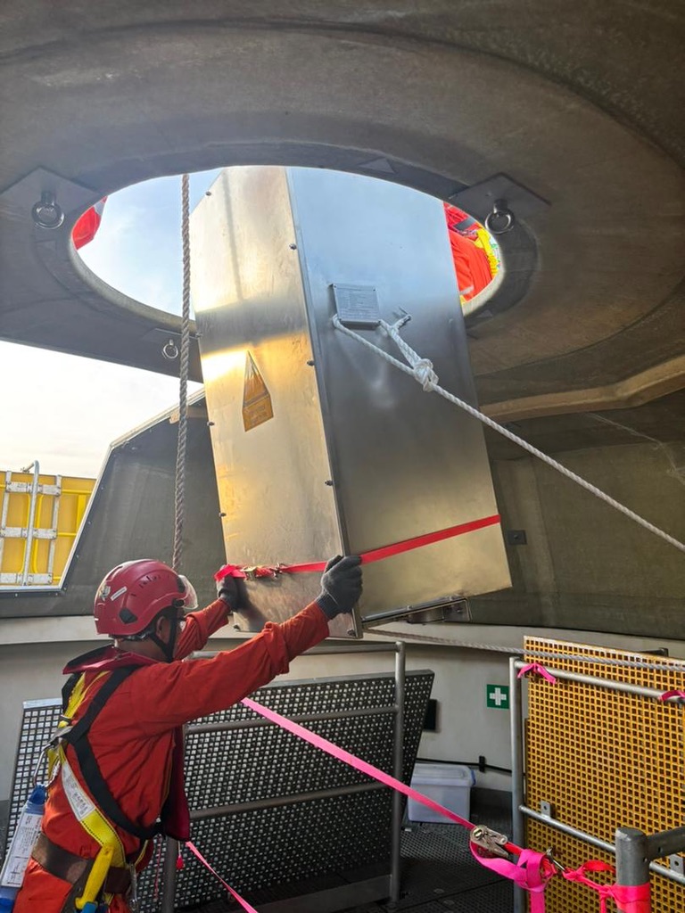 J-tube hang-off seal installation inside the OSS